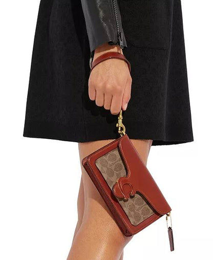tabby chain clutch in signature canvas